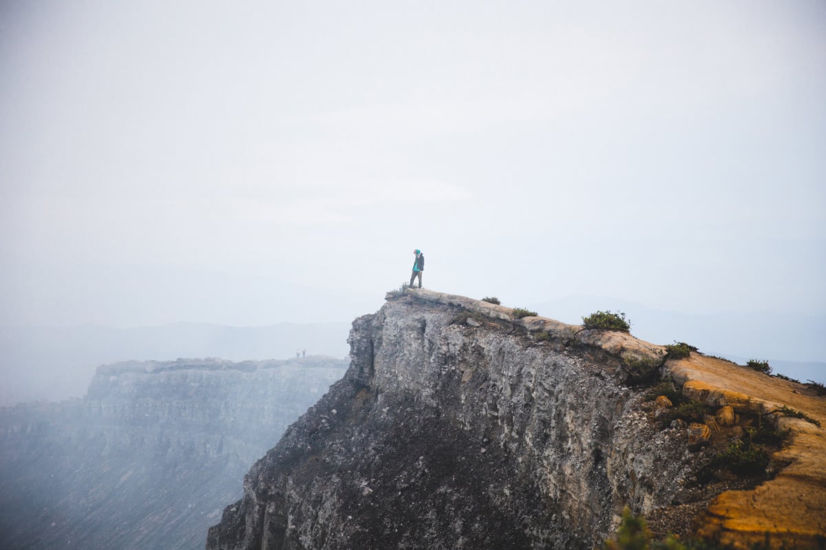 Where Your Treasure Lies - Man standing on cliff edge